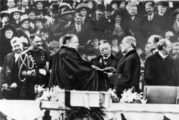 Woodrow Wilson takes the oath of office for his first term of the Presidency on the East Portico at the U.S. Capitol in Washington, D.C., on March 4, 1913.  Chief Justice is Edward D. White.  (AP Photo)