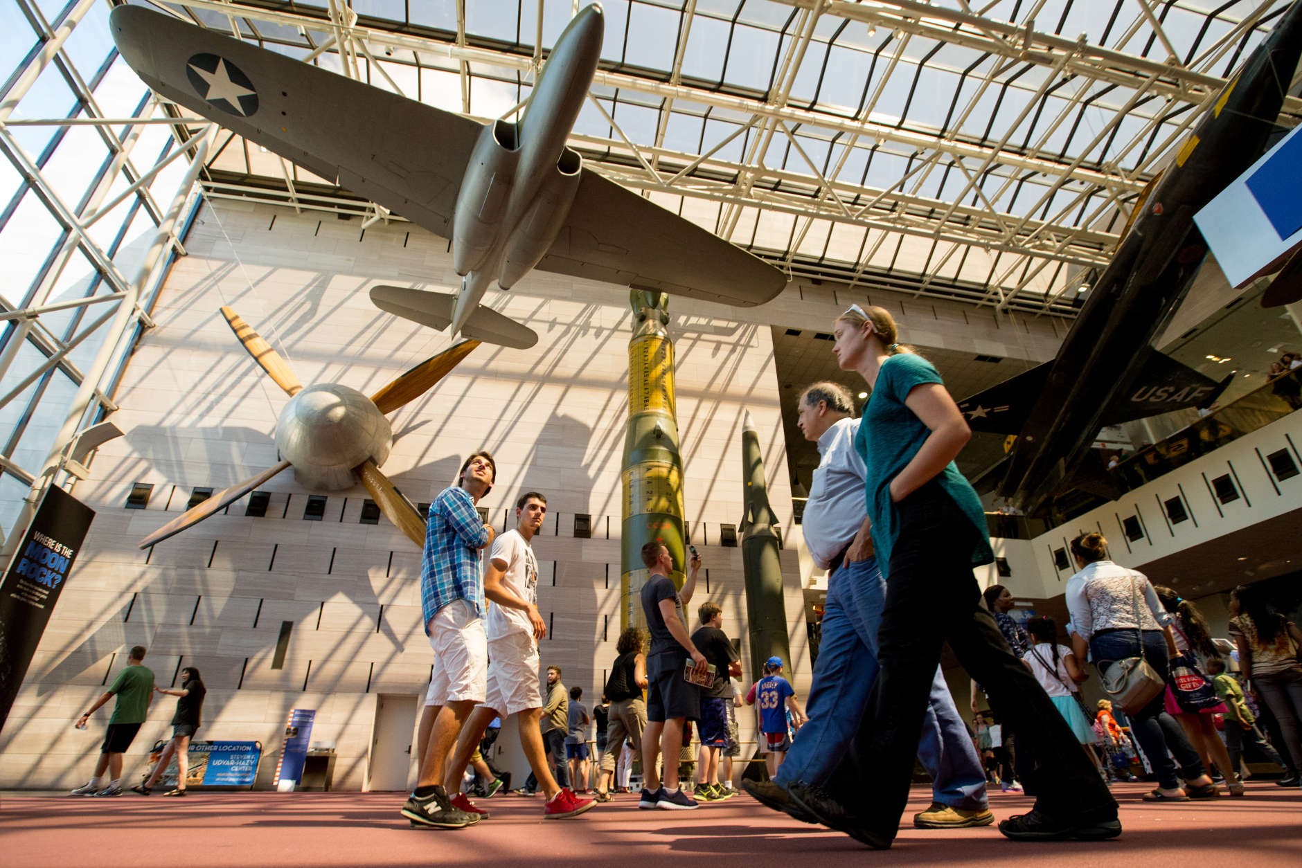 In this photo taken April 19, 2015,  people walk in the Smithsonian National Air and Space Museum in Washington. A record number of U.S. tourists visited Washington last year.
The citys tourism bureau, Destination DC, announced Tuesday, May 3, 2016, that the nations capital welcomed 19.3 million domestic visitors in 2015. Thats up one million from the 2014 total, and it shows the continuing strength of Washingtons tourism industry after the Great Recession. (AP Photo/Andrew Harnik)