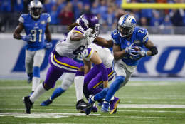 Detroit Lions cornerback Darius Slay (23) runs the ball after he makes an interception against the Minnesota Vikings during an NFL football game, Thursday, Nov. 24, 2016 in Detroit. (AP Photo/Rick Osentoski)