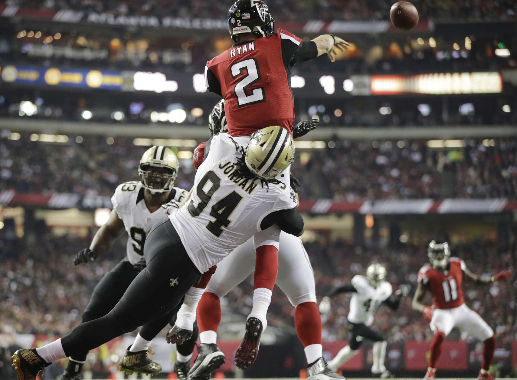 New Orleans Saints defensive end Cameron Jordan (94) pressures Atlanta Falcons quarterback Matt Ryan (2) in the end zone during the second half of an NFL football game, Sunday, Jan. 1, 2017, in Atlanta. (AP Photo/David Goldman)