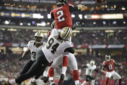 New Orleans Saints defensive end Cameron Jordan (94) pressures Atlanta Falcons quarterback Matt Ryan (2) in the end zone during the second half of an NFL football game, Sunday, Jan. 1, 2017, in Atlanta. (AP Photo/David Goldman)