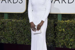 Issa Rae arrives at the 74th annual Golden Globe Awards at the Beverly Hilton Hotel on Sunday, Jan. 8, 2017, in Beverly Hills, Calif. (Photo by Jordan Strauss/Invision/AP)