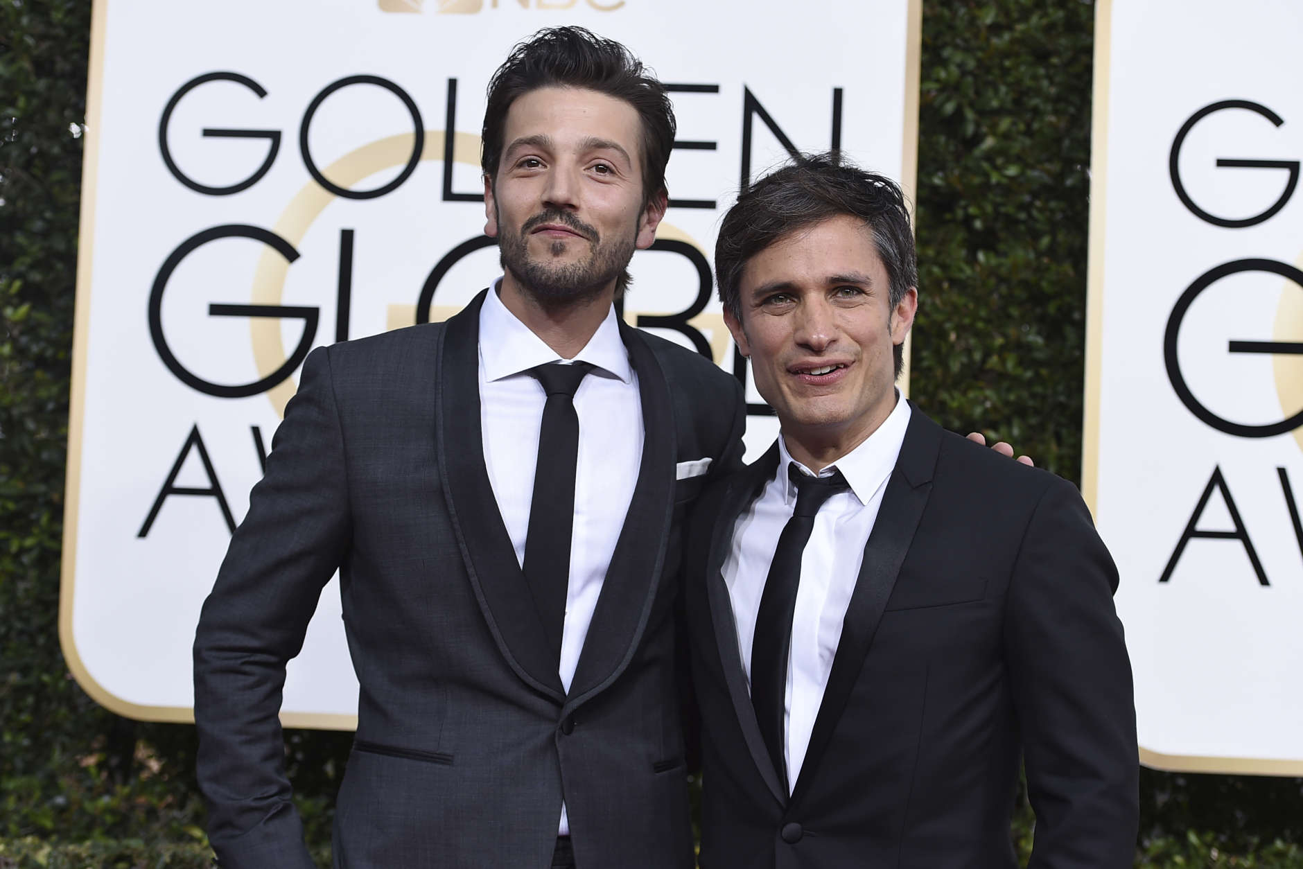 Diego Luna, left, and Gael Garcia Bernal arrive at the 74th annual Golden Globe Awards at the Beverly Hilton Hotel on Sunday, Jan. 8, 2017, in Beverly Hills, Calif. (Photo by Jordan Strauss/Invision/AP)