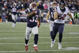New England Patriots running back Dion Lewis (33) runs ahead of Houston Texans linebacker Brian Peters (52) for a touchdown during the first half of an NFL divisional playoff football game, Saturday, Jan. 14, 2017, in Foxborough, Mass. (AP Photo/Elise Amendola)