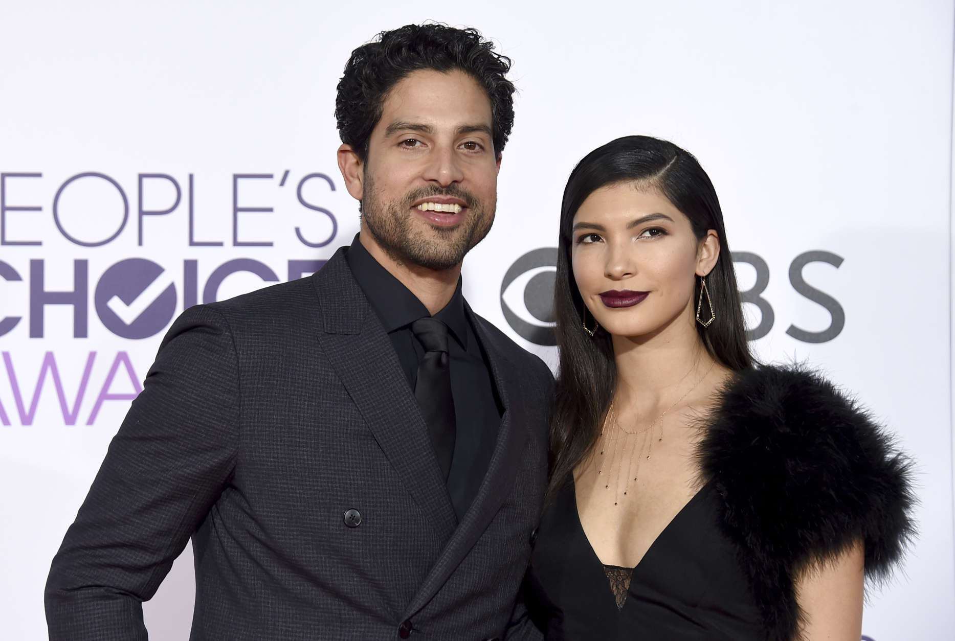 Adam Rodriguez, left, and Grace Gail arrive at the People's Choice Awards at the Microsoft Theater on Wednesday, Jan. 18, 2017, in Los Angeles. (Photo by Jordan Strauss/Invision/AP)