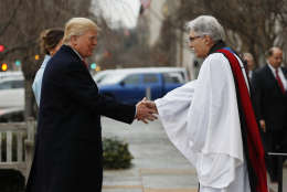 Rev Luis Leon greets President-elect Donald Trump and his wife Melania as they arrive for a church service at St. John’s Episcopal Church across from the White House in Washington, Friday, Jan. 20, 2017, on Donald Trump's inauguration day. (AP Photo/Alex Brandon)