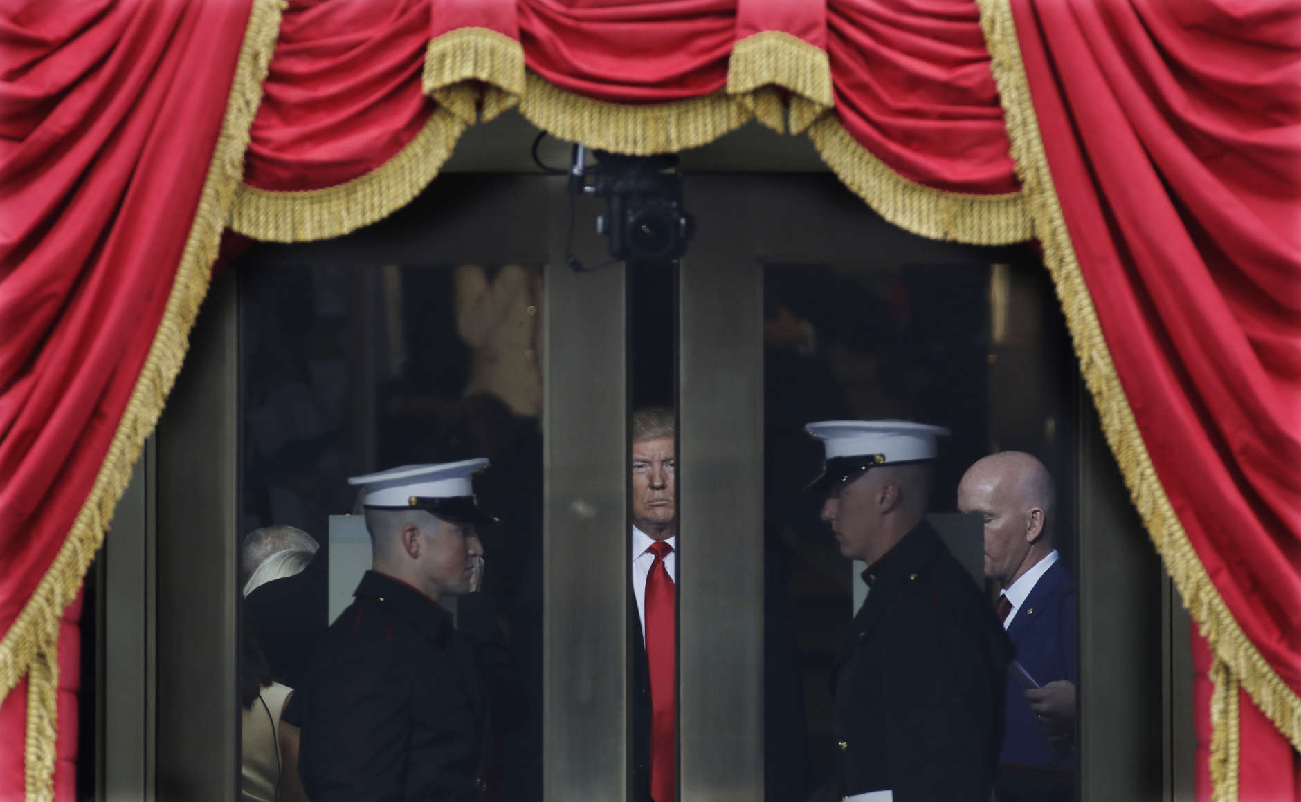 President-elect Donald Trump waits to stop out onto the portico for his Presidential Inauguration at the U.S. Capitol in Washington, Friday, Jan. 20, 2017. (AP Photo/Patrick Semansky)