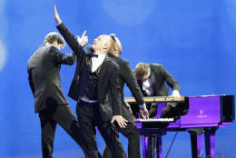 The Piano Guys perform at the Freedom Ball, Friday, Jan. 20, 2017, at the Washington Convention Center in Washington during the 58th presidential inauguration (AP Photo/Mark Tenally)