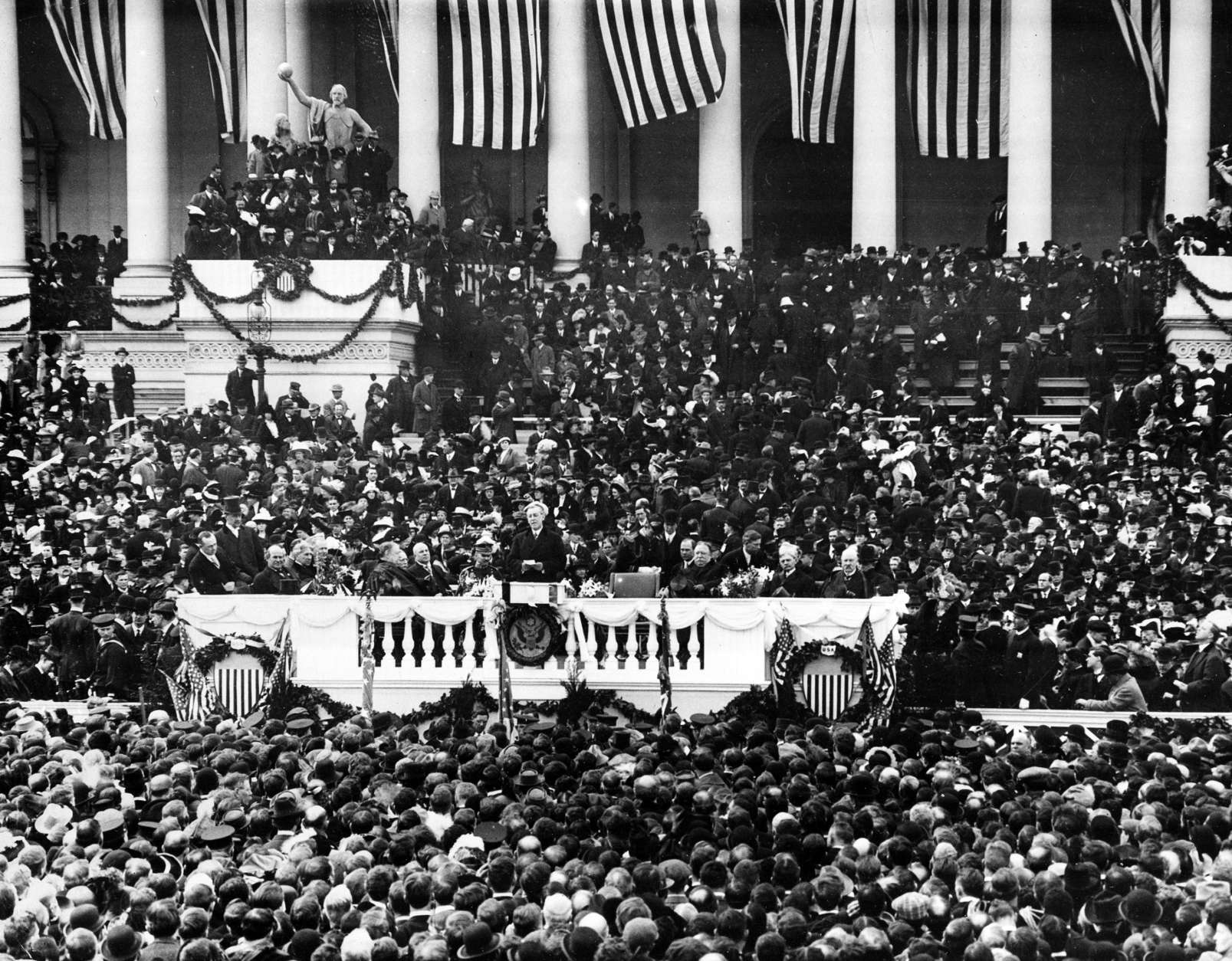 This general view shows the second inauguration of President Woodrow Wilson as he delivers his inaugural address on the East Portico of the Capitol building in Washington, D.C., on March 5, 1917.  (AP Photo)