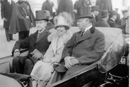 Calvin Coolidge, left, wears wing collar and muted top hat en route to take oath on inauguration day, March 4, 1925. (AP Photo)