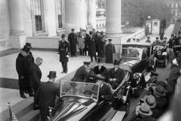 President Calvin Coolidge and President-elect Herbert Hoover, seated in car, are shown as they left the White House for Hoover's inauguration, March 4, 1929.  (AP Photo)
