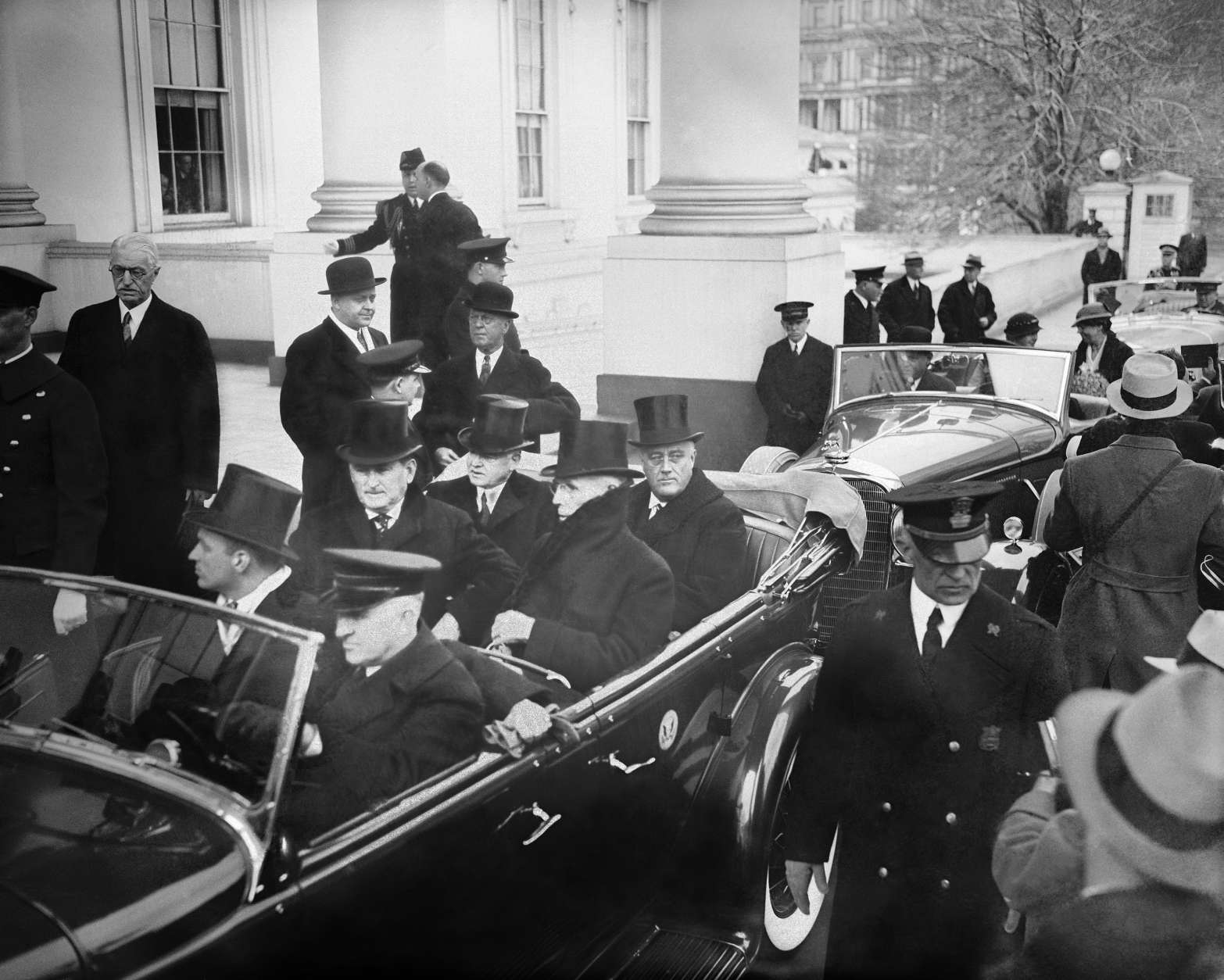 President Herbert Hoover, left, and President-elect Franklin D. Roosevelt are shown as they left the White House for Roosevelt's inauguration, March 4, 1933.  (AP Photo)