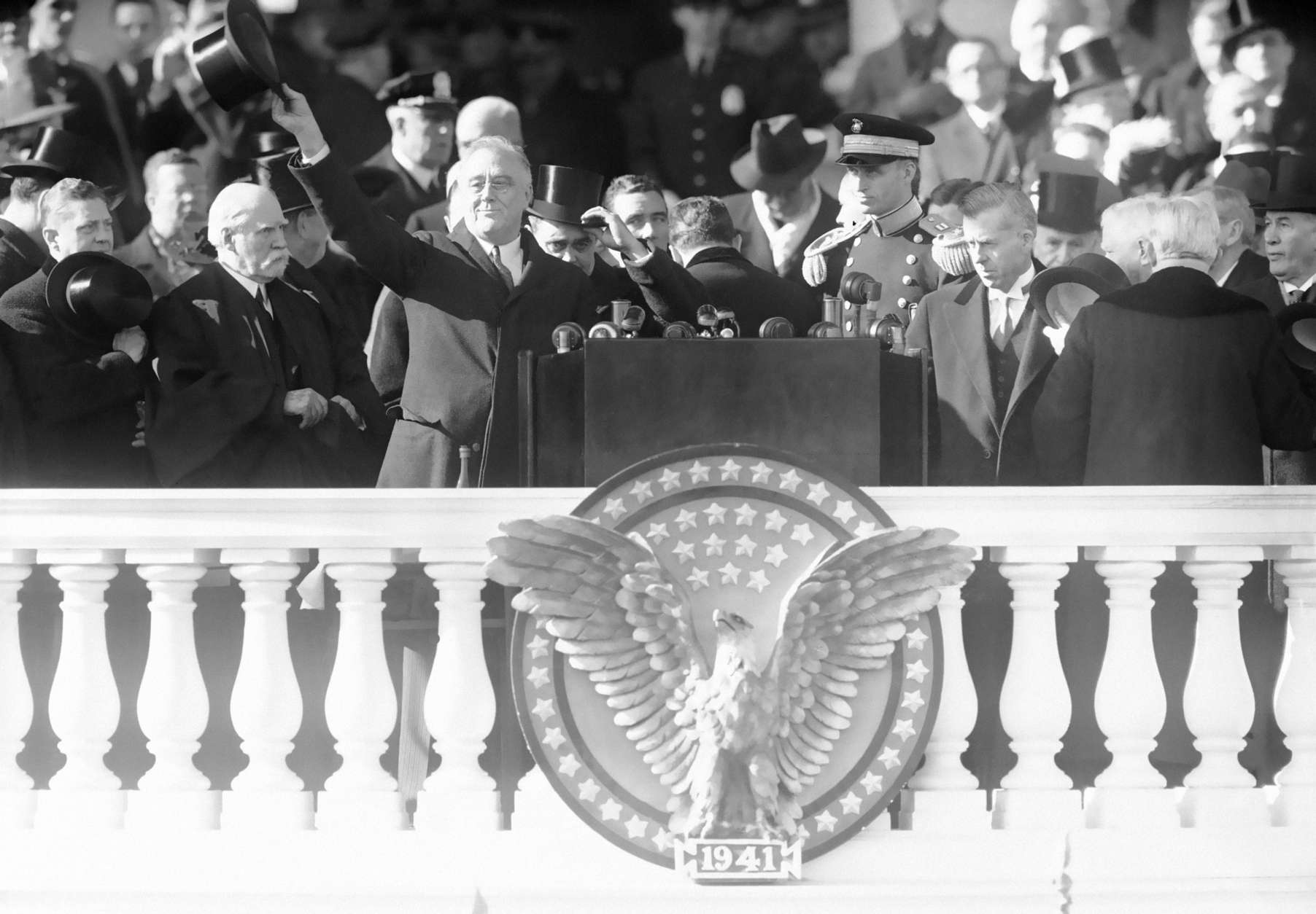 FILE - This Jan. 20, 1941 black-and-white file photo shows President Franklin Delano Roosevelt waving from the inaugural stand on Capitol Hill in Washington. Sixteen presidents before Barack Obama got a second chance at giving an inaugural address for the ages. Most didnt make much of it. Abraham Lincoln is the grand exception. (AP Photo, File)