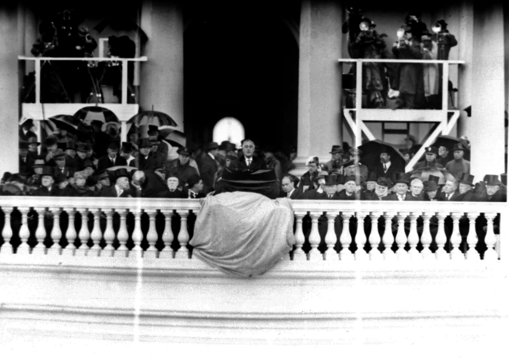 President Franklin D. Roosevelt speaks during his rainy second inaugural ceremony in Washington, Jan. 20, 1937. (AP Photo)