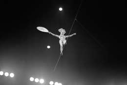 A woman walks a tightrope at the circus in 1955