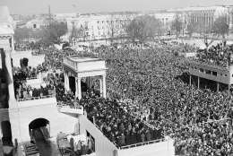 ** FILE ** In this Jan. 20, 1961 black-and-white file photo, shows a general view of the crowd in Capitol Plaza to witness the inauguration of John F. Kennedy as President of the United States.  President-elect Barack Obama's inauguration is expected to draw 1 million-plus to the capital, and already some lawmakers have stopped taking ticket requests and hotels have booked up. (AP Photo, File)