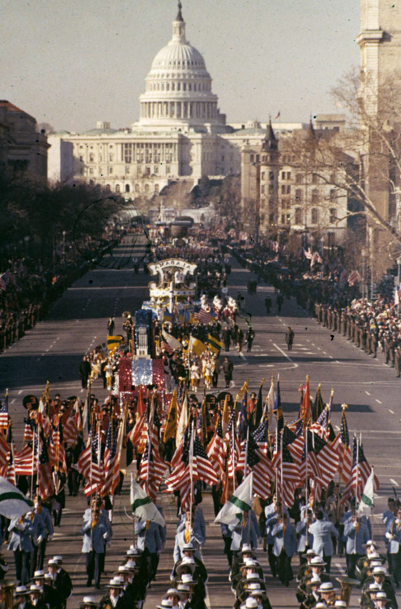 This is a general view of the Inaugural Parade proceeding down Washington's Pennsylvania Avenue with the Capitol building visible in the background, Jan. 20, 1977.  Jimmy Carter was sworn in as the 39th president of the United States during the inauguration ceremonies earlier.  (AP Photo)