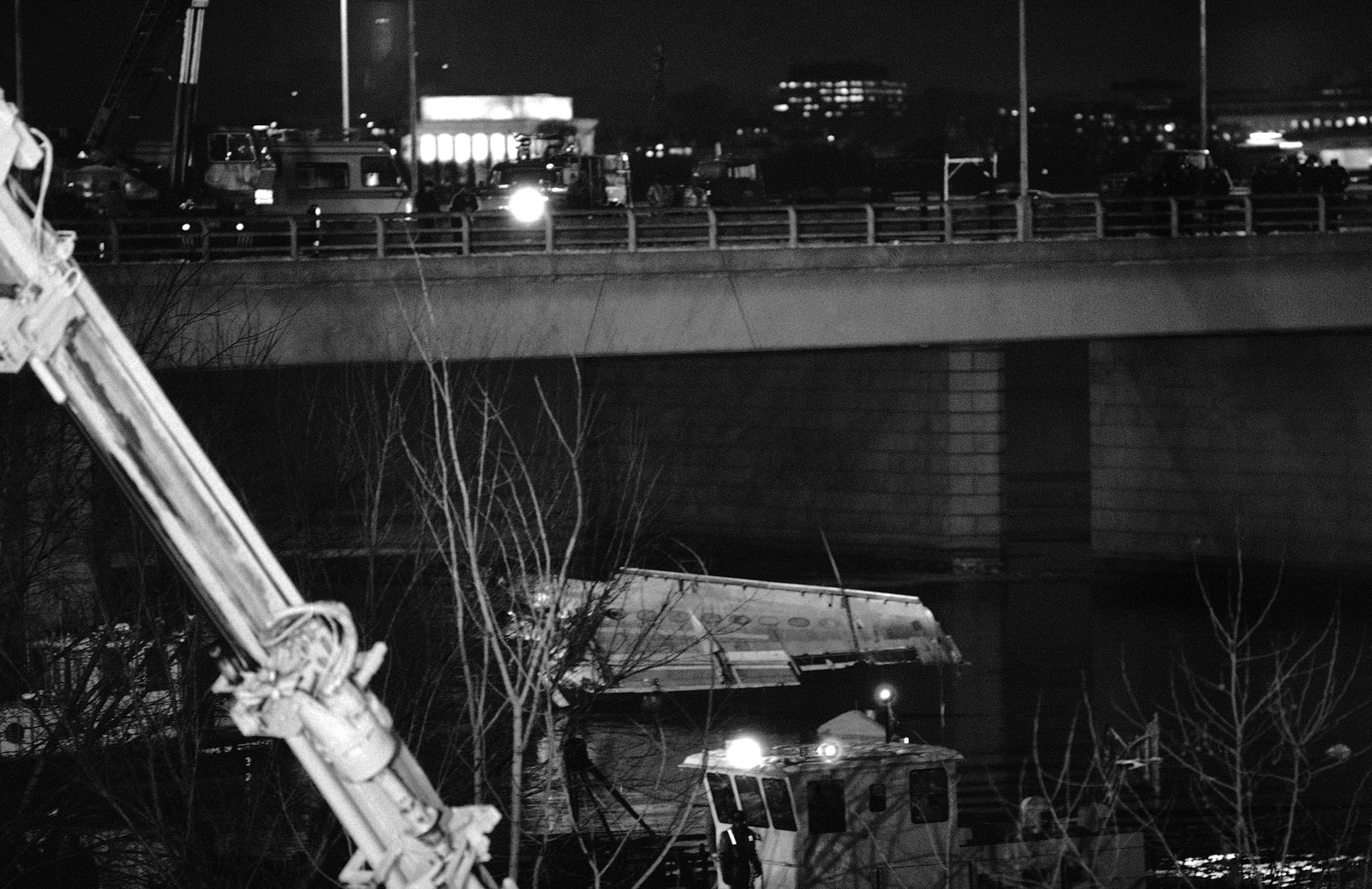 A section of a wing of the Air Florida jetliner which crashed into Washington’s Potomac River on Wednesday is raised from the water, Friday, Jan. 15, 1982. Salvage workers labored through the day Friday, trying to find victims of the crash, portions of the plane and the cockpit recorders which were aboard. (AP Photo)