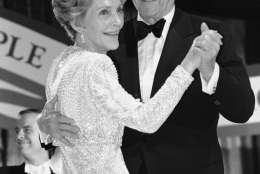 President Reagan and Mrs. Reagan have the first dance at the Inaugural Ball for Young Americans at the D.C. Armory at night on Monday, Jan. 21, 1985 in Washington. (AP Photo/Ira Schrawz)