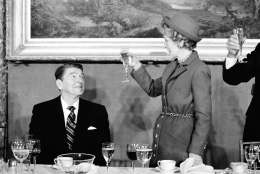 First lady Nancy offers a toast to President Ronald Reagan during the inaugural luncheon at the Capitol shortly after he re-enacted his oath-taking on Monday, Jan. 21, 1985. The ceremonies were forced inside due to bitter cold weather in the capital city. (AP Photo/John Duricka)