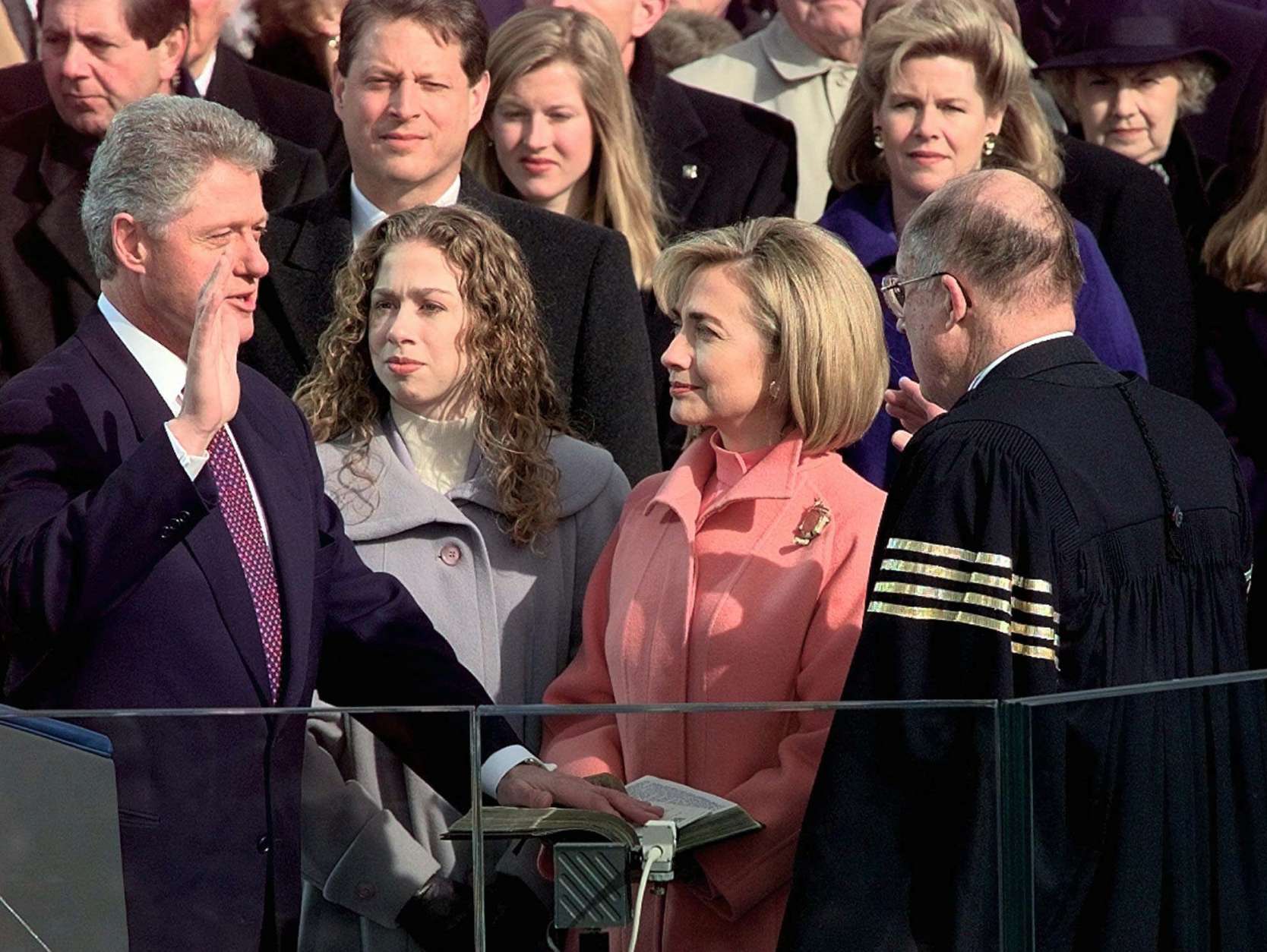 Supreme Court Chief Justice William Rehnquist administers the presidential oath to President Clinton as first lady Hillary Rodham Clinton and daughter Chelsea look on, Monday Jan. 20, 1997 on Capitol Hill. Vice President and Mrs. Gore look on behind the first family. (AP Photo/Doug Mills)