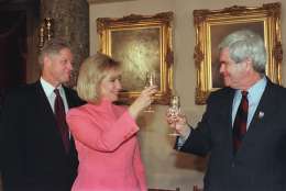President Clinton looks on as first lady Hillary Rodham Clinton toasts House Speaker Newt Gingrich, of Ga., during an inaugural luncheon on Capitol Hill Monday Jan. 20, 1997. (AP Photo/Joyce Naltchayan/Pool)