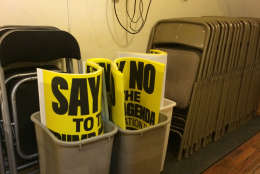 Bins with protest posters