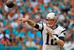 MIAMI GARDENS, FL - JANUARY 01:  Tom Brady #12 of the New England Patriots passes during a game against the Miami Dolphins at Hard Rock Stadium on January 1, 2017 in Miami Gardens, Florida.  (Photo by Mike Ehrmann/Getty Images)