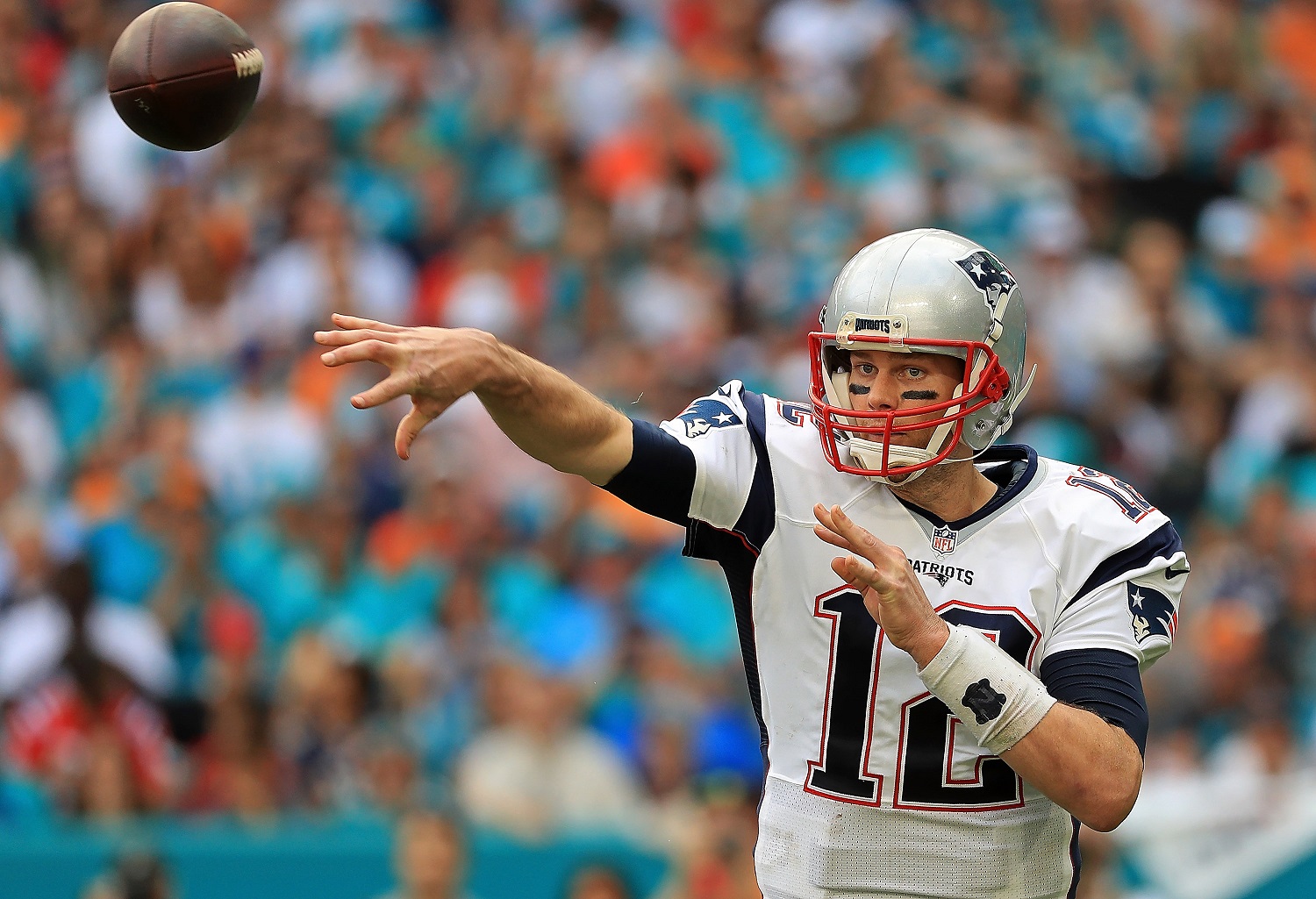 MIAMI GARDENS, FL - JANUARY 01:  Tom Brady #12 of the New England Patriots passes during a game against the Miami Dolphins at Hard Rock Stadium on January 1, 2017 in Miami Gardens, Florida.  (Photo by Mike Ehrmann/Getty Images)