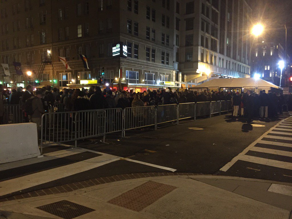 The line at 12th and E streets are long, but not unmanageable early Friday morning. (WTOP/Dennis Foley)