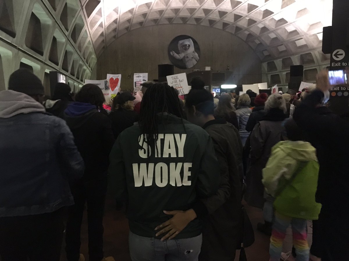 Thick crowds slowly stream out of the L'Enfant station en route to the Women's March on Washington on Saturday, Jan. 21, 2017. (WTOP/Max Smith) 