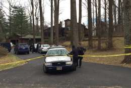 Police at the scene of a multiple-death investigation in McLean, Virginia, Friday afternoon. (WTOP/Michelle Basch)