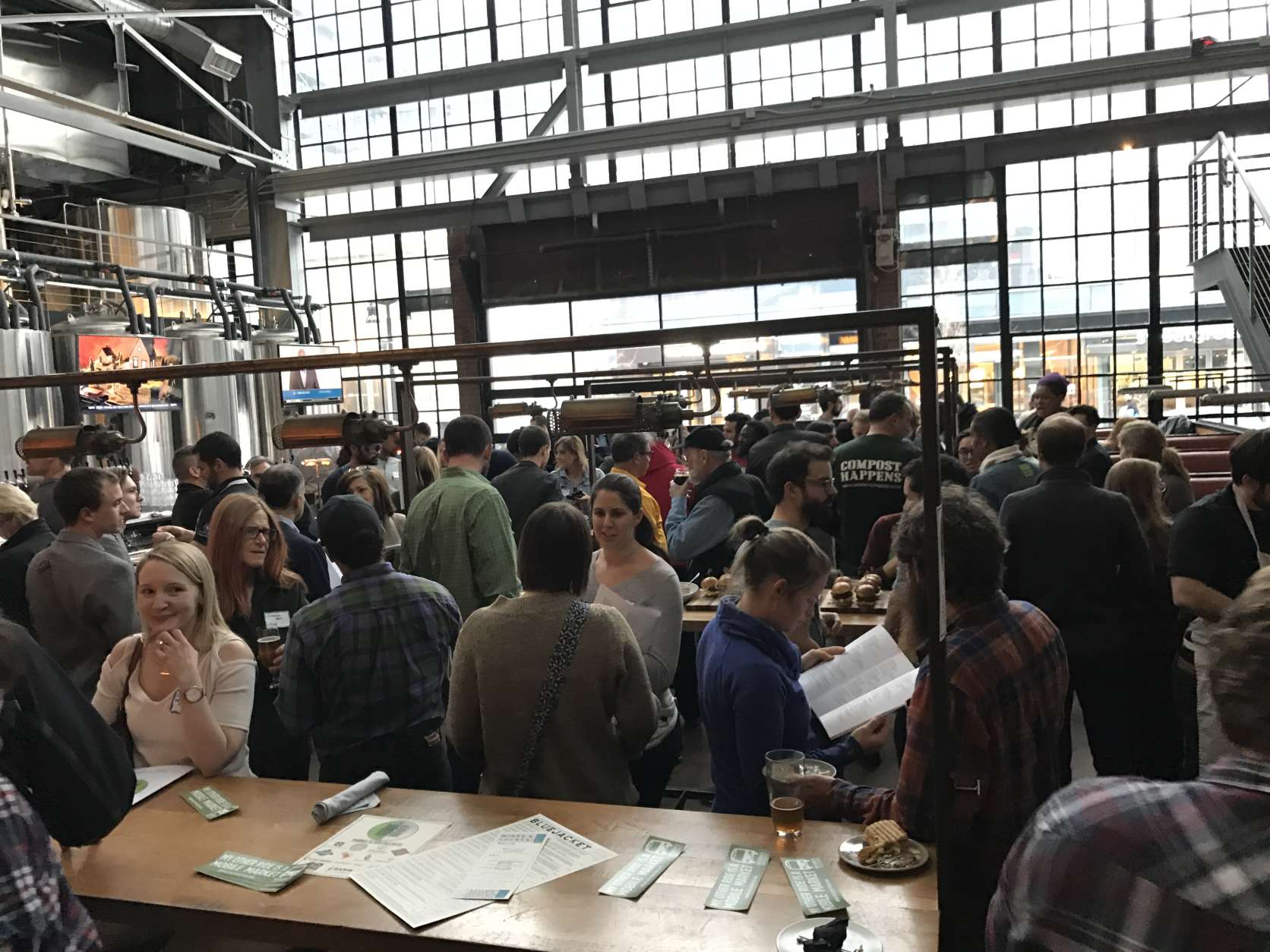 On Monday night, more than 100 men and women flooded the bar of Bluejacket Brewery for a speed-dating event. Only, they weren’t looking for love. They were looking for chefs. (WTOP/Rachel Nania) 