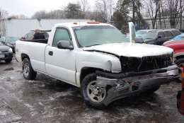 Liem T. Buyen was near his white 2003 Chevrolet Silverado when he was hit. (Courtesy Virginia State Police)