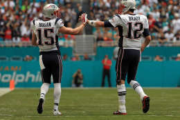 MIAMI GARDENS, FL - JANUARY 01: Tom Brady #12 and Chris Hogan #15 of the New England Patriots celebrate a touchdown during a game against the Miami Dolphins at Hard Rock Stadium on January 1, 2017 in Miami Gardens, Florida.  (Photo by Mike Ehrmann/Getty Images)