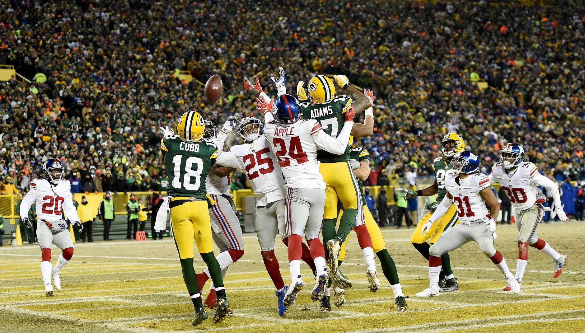 GREEN BAY, WI - JANUARY 08:  Randall Cobb #18 of the Green Bay Packers catches a touchdown pass in the second quarter during the NFC Wild Card game against the New York Giants at Lambeau Field on January 8, 2017 in Green Bay, Wisconsin.  (Photo by Stacy Revere/Getty Images)
