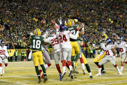 GREEN BAY, WI - JANUARY 08:  Randall Cobb #18 of the Green Bay Packers catches a touchdown pass in the second quarter during the NFC Wild Card game against the New York Giants at Lambeau Field on January 8, 2017 in Green Bay, Wisconsin.  (Photo by Stacy Revere/Getty Images)