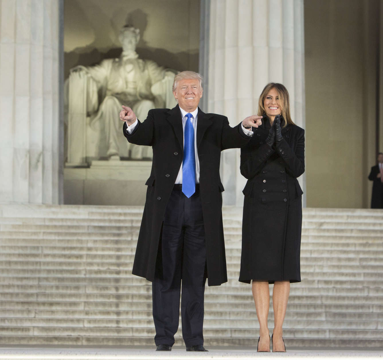 WASHINGTON, DC - JANUARY 19:  (AFP OUT) President-elect of The United States Donald J. Trump and first lady-elect of The United States Meliana Trump arrive at the "Make America Great Again Welcome Celebration concert at the Lincoln Memorial in January 19, 2017 in Washington, DC. Hundreds of thousands of people are expected to come to the National Mall to witness Trump being sworn in as the 45th president of the United States. (Photo by Chris Kleponis-Pool/Getty Images)