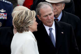 WASHINGTON, DC - JANUARY 20: Former Democratic presidential nominee Hillary Clinton whispers to former President George W. Bush  on the West Front of the U.S. Capitol on January 20, 2017 in Washington, DC. In today's inauguration ceremony Donald J. Trump becomes the 45th president of the United States.  (Photo by Joe Raedle/Getty Images)