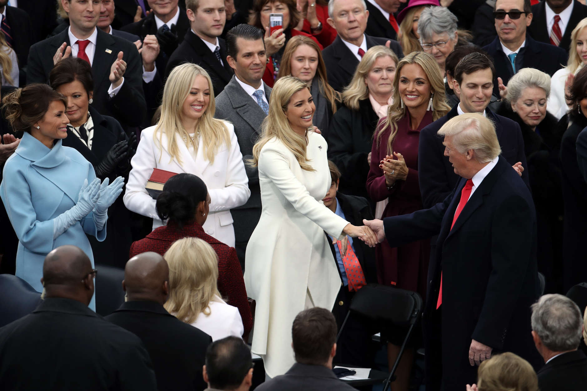 WASHINGTON, DC - JANUARY 20:  U.S. President-elect Donald Trump (R) is greeted by (L-R) wife Melania Trump, and daughters Tiffany Trump and Ivanka Trump on the West Front of the U.S. Capitol on January 20, 2017 in Washington, DC. In today's inauguration ceremony Donald J. Trump becomes the 45th president of the United States.  (Photo by Drew Angerer/Getty Images)