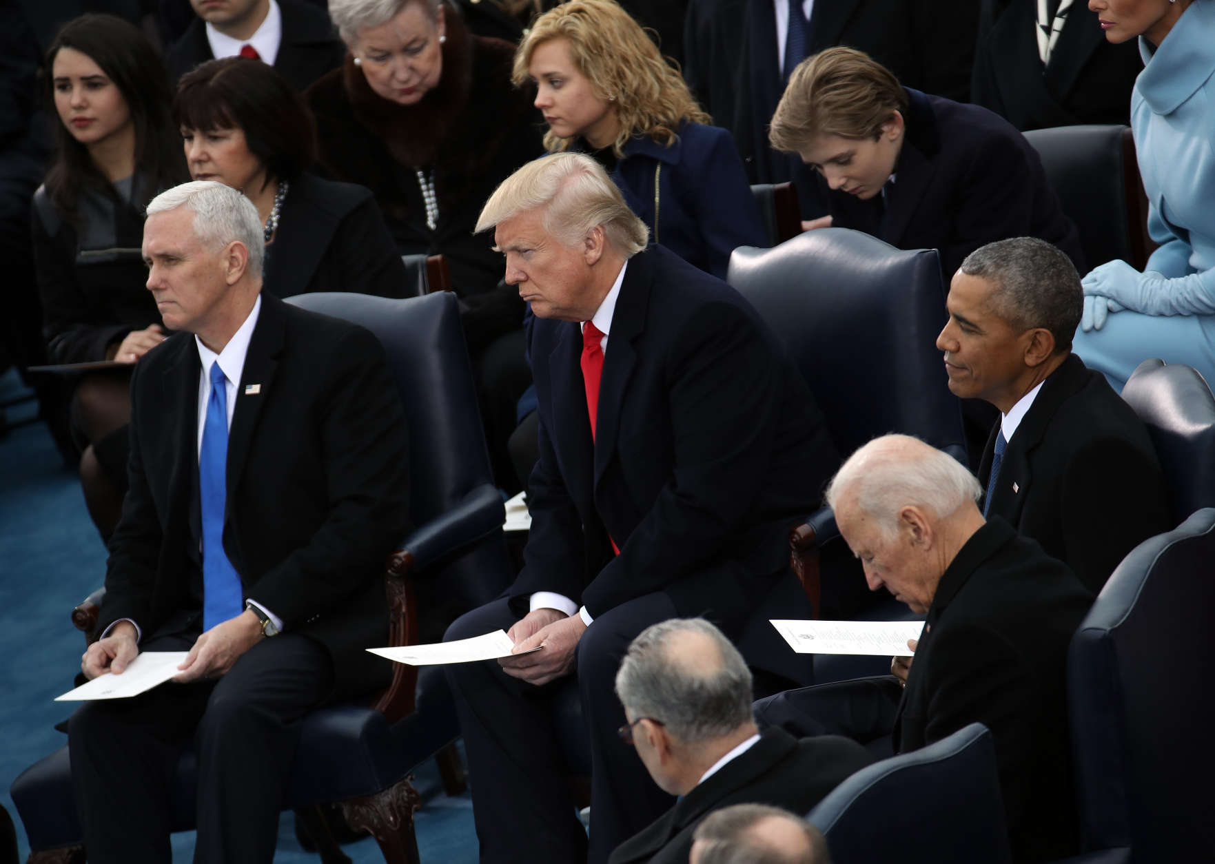 WASHINGTON, DC - JANUARY 20:  (L-R) U.S. Vice President-elect Mike Pence, President-elect Donald Trump, Vice President Joe Biden, Barron Trump and President Barack Obama take their seats on the West Front of the U.S. Capitol on January 20, 2017 in Washington, DC. In today's inauguration ceremony Donald J. Trump becomes the 45th president of the United States.  (Photo by Drew Angerer/Getty Images)
