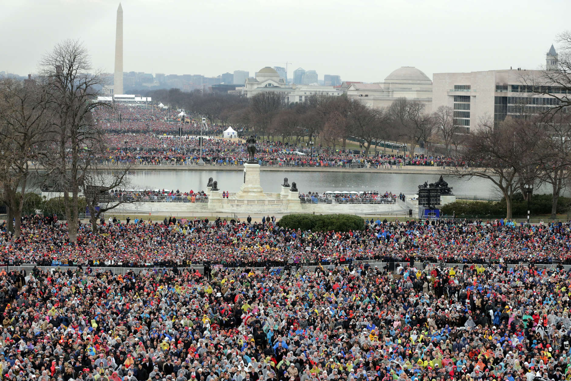 WASHINGTON, DC - JANUARY 20:  Crowds on the National Mall and in front of the U.S. Capitol watch U.S. President Donald Trump deliver his inaugural address on the West Front of the U.S. Capitol on January 20, 2017 in Washington, DC. In today's inauguration ceremony Donald J. Trump becomes the 45th president of the United States.  (Photo by Chip Somodevilla/Getty Images)