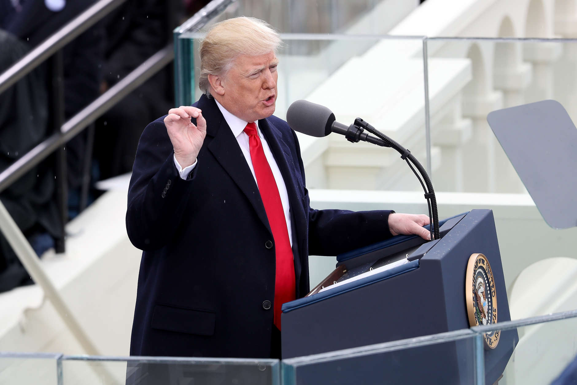 WASHINGTON, DC - JANUARY 20: President Donald Trump delivers his inaugural address on the West Front of the U.S. Capitol on January 20, 2017 in Washington, DC. In today's inauguration ceremony Donald J. Trump becomes the 45th president of the United States.  (Photo by Joe Raedle/Getty Images)