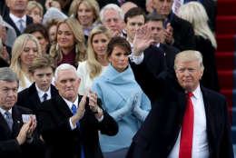 WASHINGTON, DC - JANUARY 20:  President Donald Trump waves as Vice President Mike Pence and First Lady Melania Trump applaud on the West Front of the U.S. Capitol on January 20, 2017 in Washington, DC. In today's inauguration ceremony Donald J. Trump becomes the 45th president of the United States.  (Photo by Alex Wong/Getty Images)