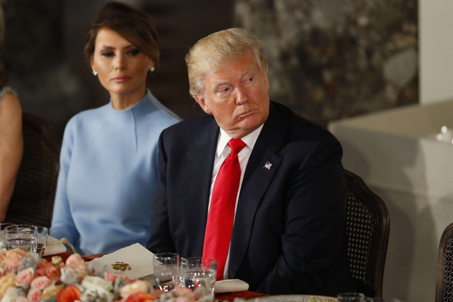 WASHINGTON, DC - JANUARY 20:  President Donald Trump and first lady Melania Trump attend the Inaugural Luncheon in the US Capitol January 20, 2017 in Washington, DC. President Trump is attending the luncheon along with other dignitaries after being sworn in as the 45th President of the United States. (Photo by Aaron P. Bernstein/Getty Images)