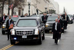 WASHINGTON, DC - JANUARY 20:  The presidential limousine carrying U.S. President Donald Trump and first lady Melania Trump turns onto Pennsylvania Avenue during the Inaugural Parade on January 20, 2017 in Washington, DC. Donald J. Trump was sworn in today as the 45th president of the United States.  (Photo by Drew Angerer/Getty Images)