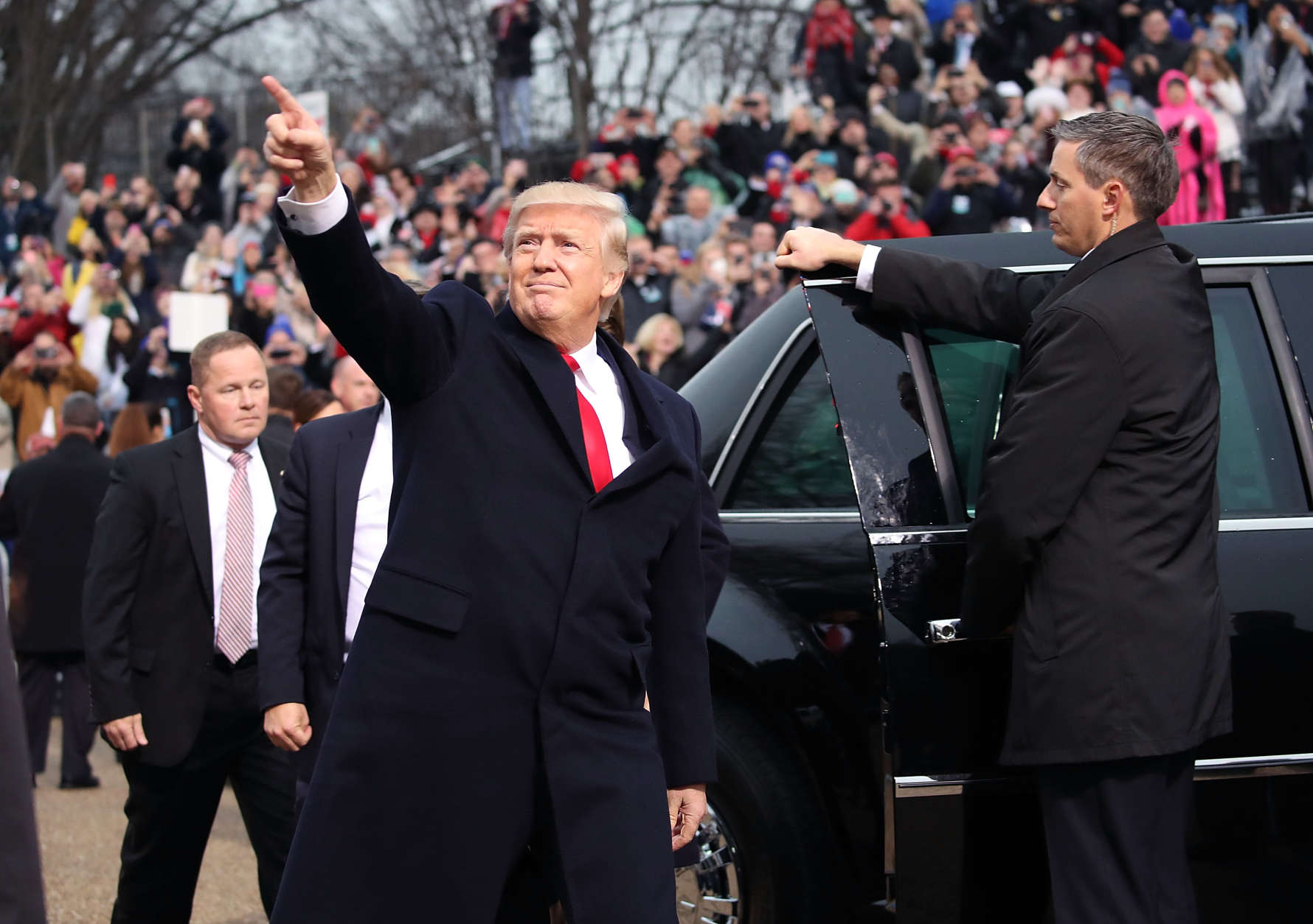 WASHINGTON, DC - JANUARY 20: U.S. President Donald Trump gestures after getting out of his car in front of the White House on January 20, 2017 in Washington, DC. President Trump was sworn in as the nation's 45th president during an inaugural ceremony at the U.S. Capitol, on January 20, 2017 in Washington, DC.  (Photo by Mark Wilson/Getty Images)