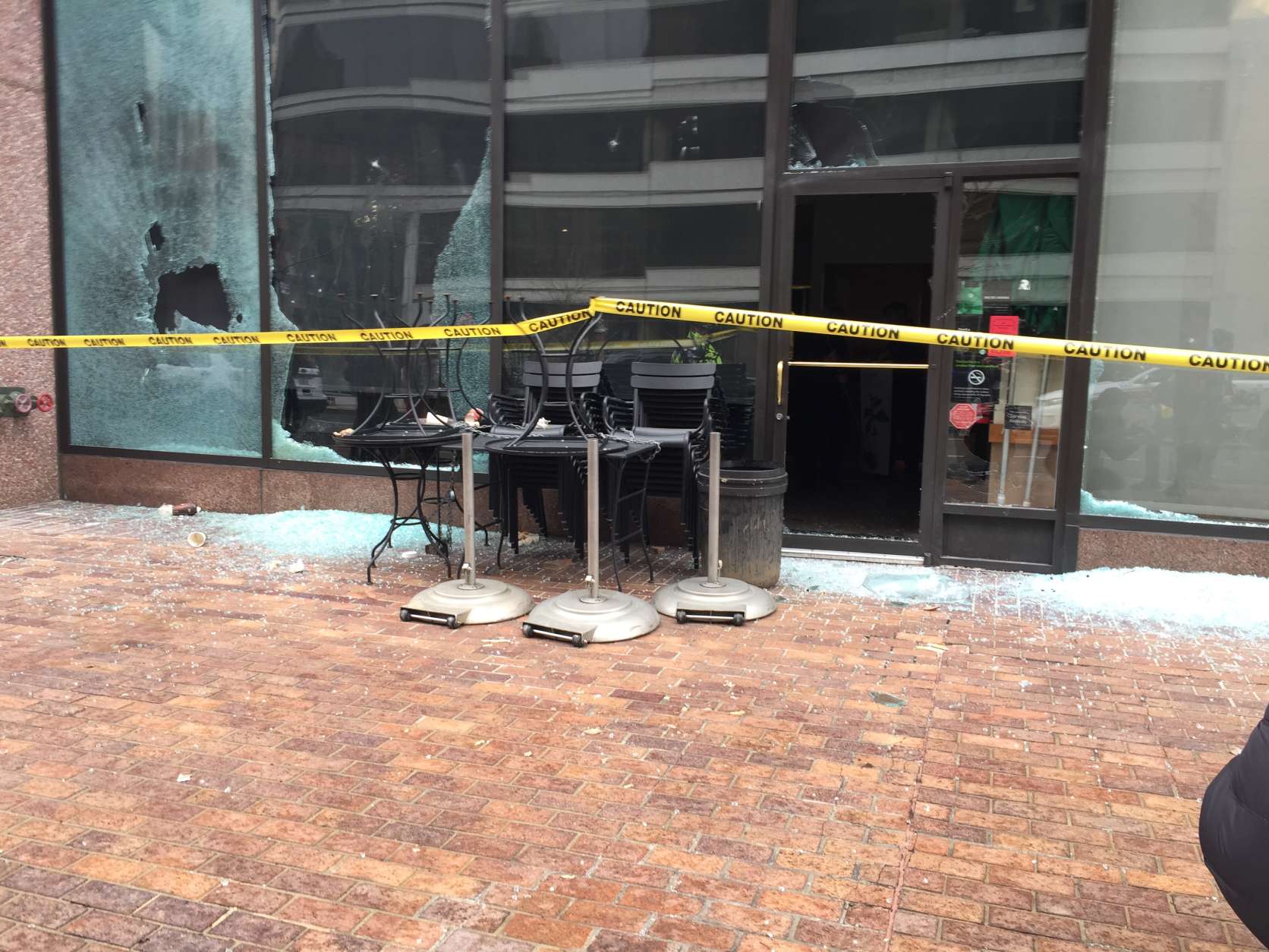 The window of a Starbucks was broken at 13th and I streets in northwest Washington. (WTOP/Dennis Foley)