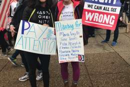 Two D.C. residents proudly display their signs as they prepare for the Women's March on Washington in D.C. on Saturday morning, Jan. 21, 2017. (Courtesy Valerie Echeveste)