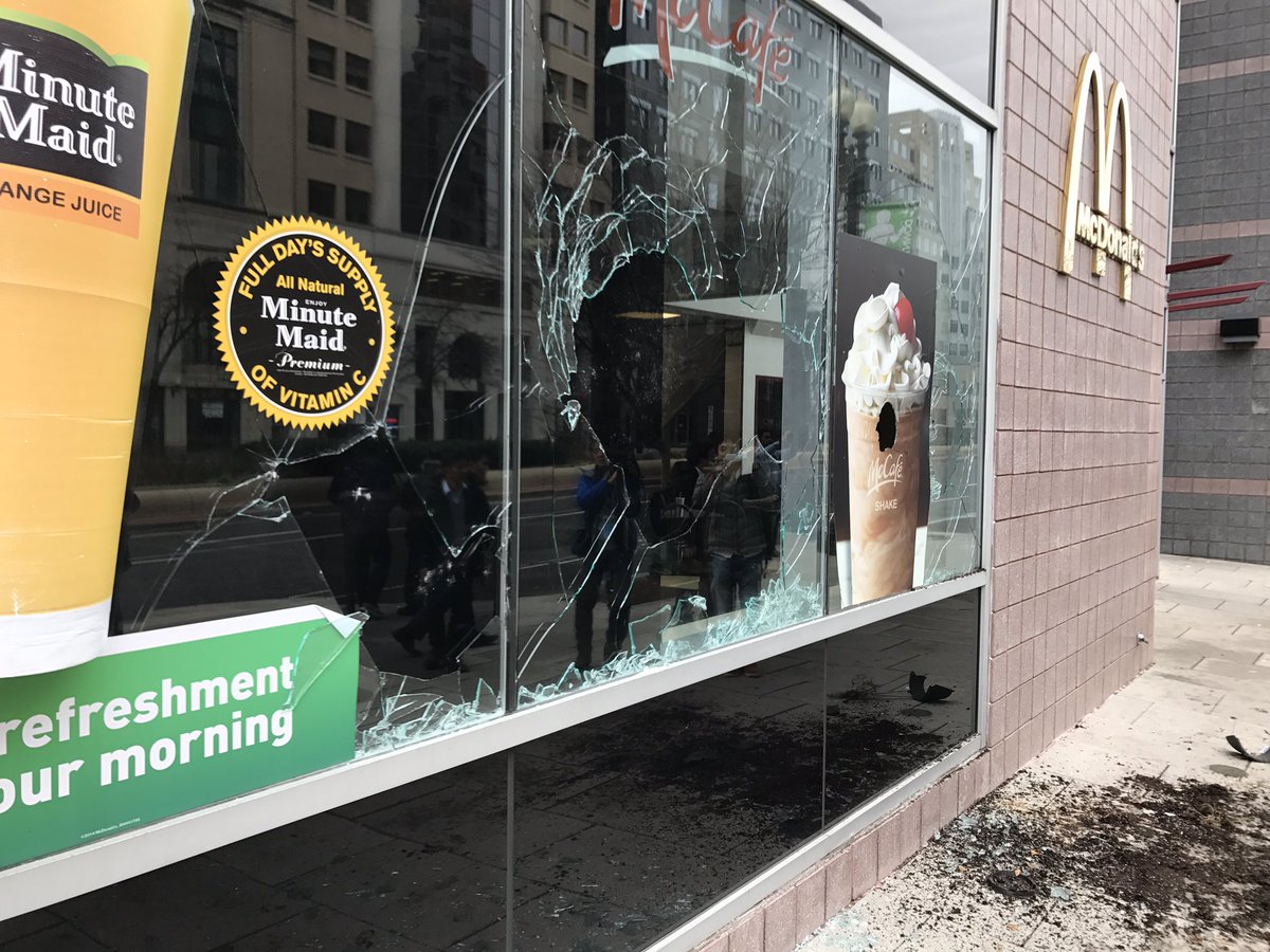 The window of a McDonald's at 13th Street and New York Avenue Northwest was also smashed. (WTOP/Neal Augenstein)